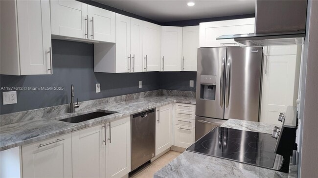 Building Photo - 633 NE 16th Ave Unit 1 Rental