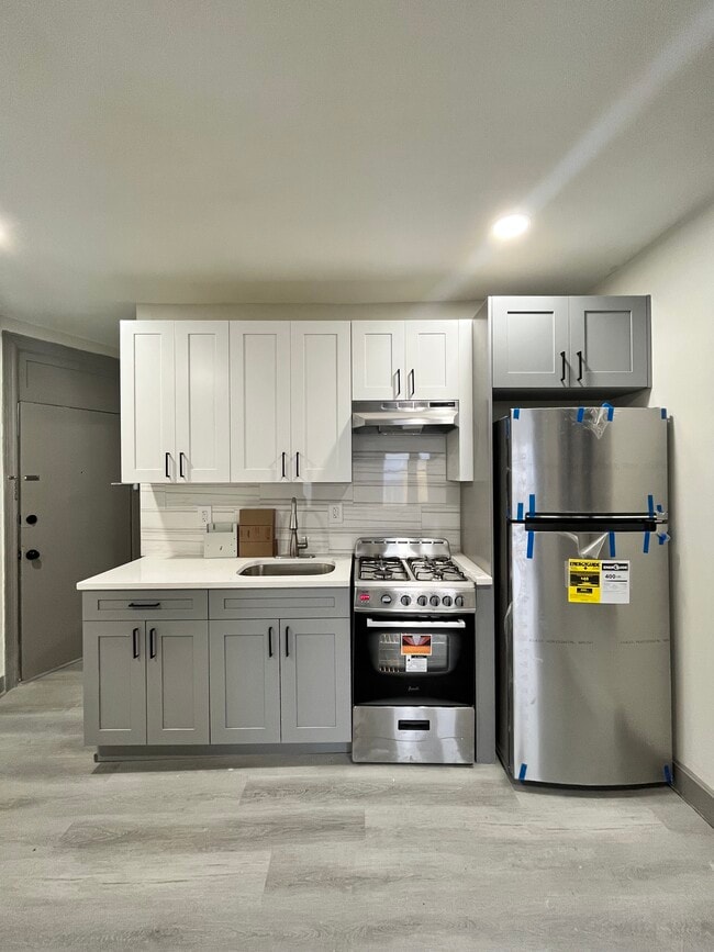 Building Photo - 818 Communipaw Ave Unit 1F