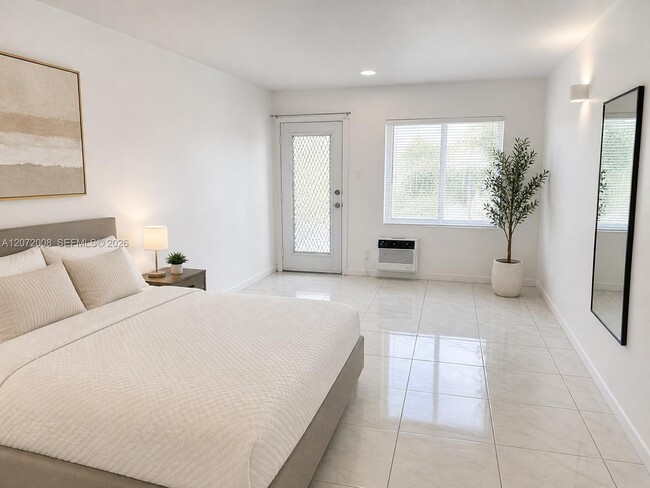 Building Photo - 6498 Collins Ave Unit 40
