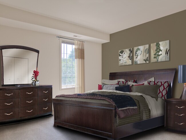 Carpeted bedroom with accent wall