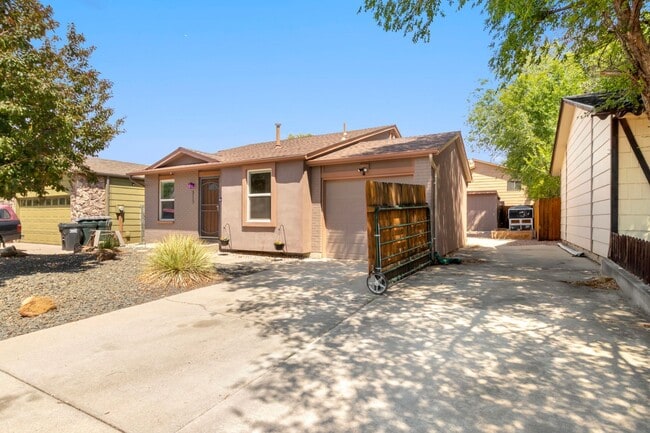 Photo - Updated 4-Bedroom Home with Central A/C & Xeriscaped Yard