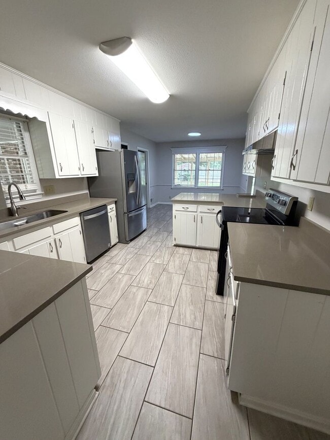 Photo - 4 bedroom 2 bath house in Woodridge available August 1st!