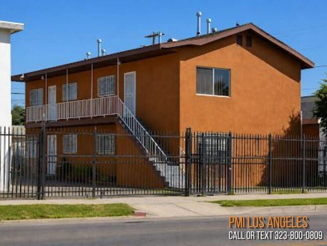 Building Photo - 8306 Main St Unit 4