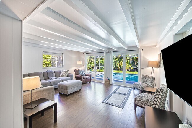 Building Photo - ***FULLY FURNISDHED ANNUAL RENTAL***POOL H...
