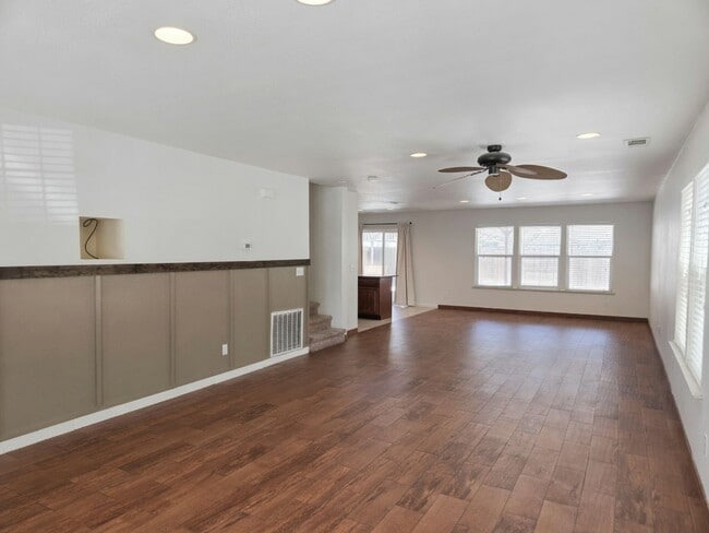 Photo - Spacious 4-Bedroom Home with Solar, Finished Garage, Large Pantry & Low-Maintenance Backyard in M...