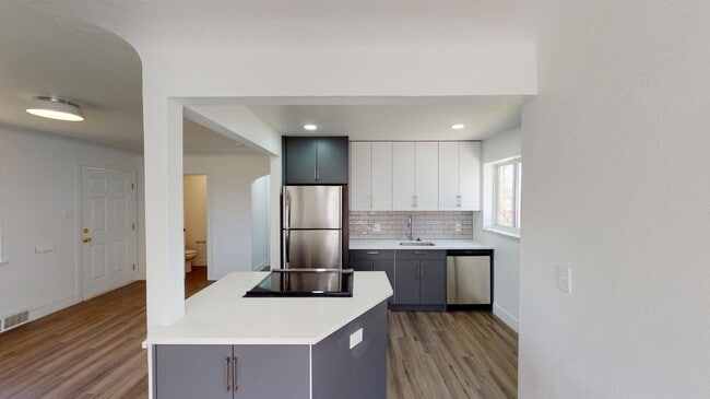 Photo - Renovated Park Hill brick home with large ...