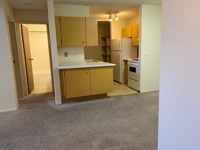 Photo - 7301-734A 4a St SW