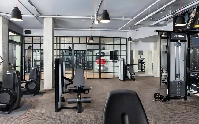 Machines out here and a mirrored studio behind, both on the same level.