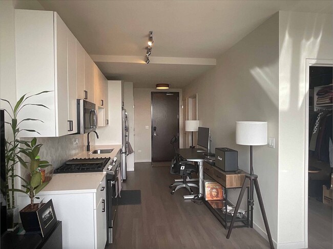 Kitchen and workspace area - 2480 N Milwaukee Ave Unit Studio Sublease