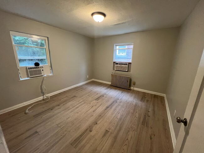 Photo - Spacious, Newly Updated 1-Bed Near UC & Downtown — Off-Street Parking, Radiant Heat Unit 3