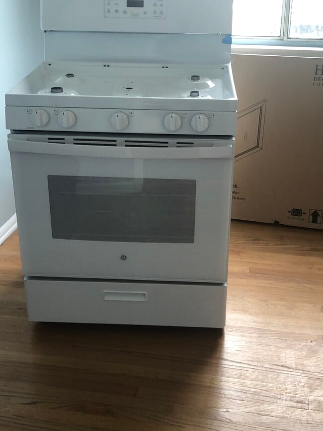 New gas range with overhead Microwave - 5727 S Corning Ave Unit 5727