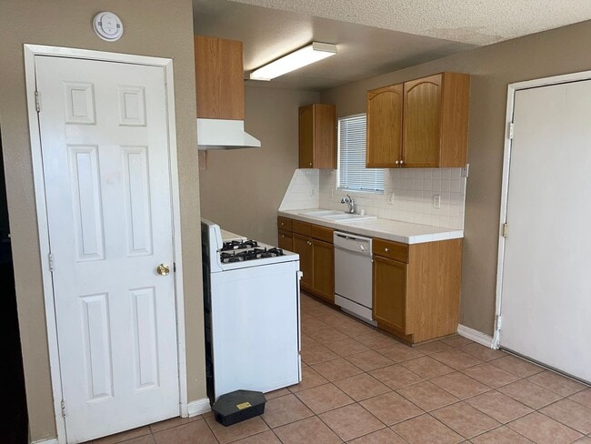 Photo - Move-In Ready 3-Bedroom Home with Backyard Living