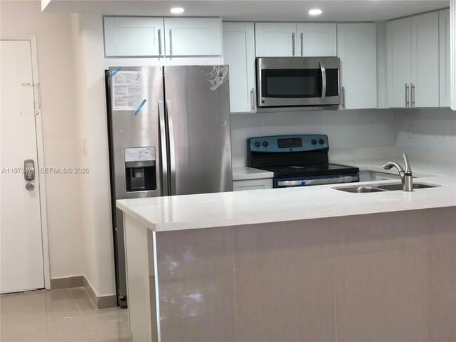 Building Photo - 8883 Fontainebleau Blvd Unit 101-A