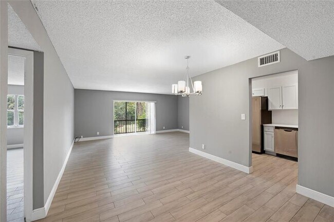 Building Photo - 3280 Spanish Moss Terrace Unit 108 Rental