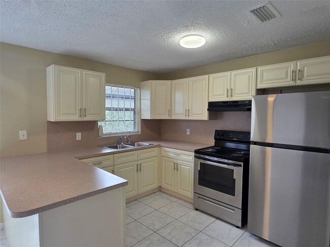 309 NE 169th St