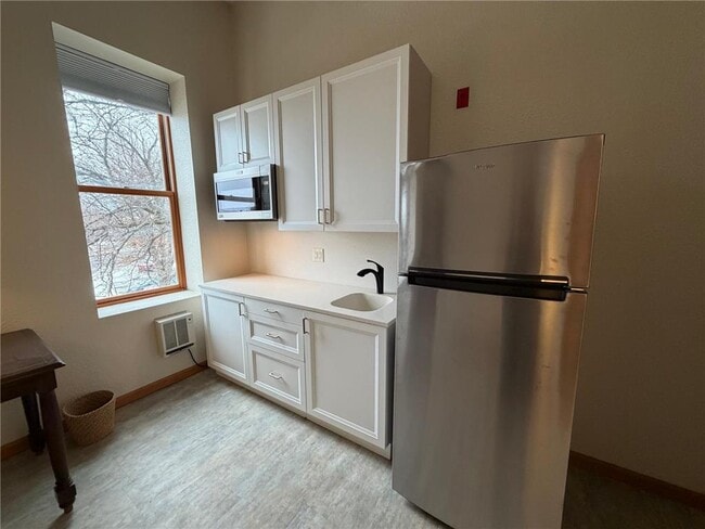 Building Photo - 542 Benson Ave SW Unit 228