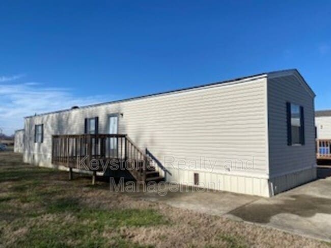 Building Photo - 703 Trevor Ln