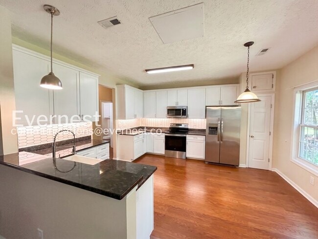 Photo - 4 Bed - 2.5 Bath Spacious Home with Modern Amenities and Community Perks / Available Now!