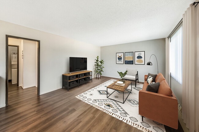 Renovated Package I living room with hard surface flooring (select homes)
