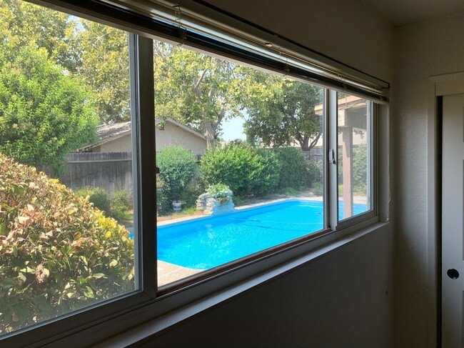 Photo - Enjoy the Backyard Pool at This 4-Bedroom ...