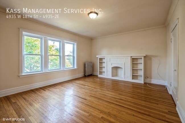Building Photo - 4935 W 18th St Unit 4935-2E