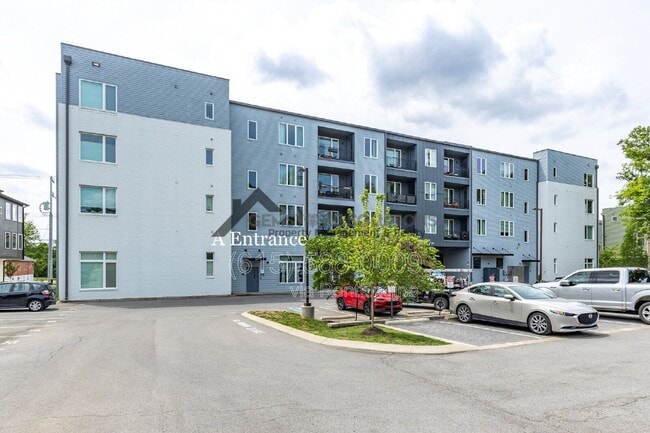 Building Photo - 1041 E Trinity Ln Unit 218