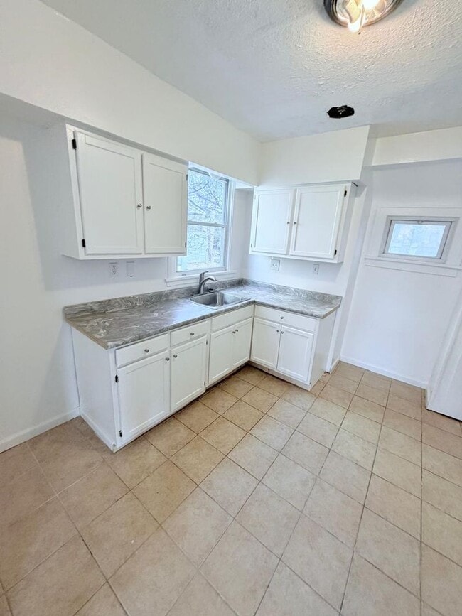 Photo - Spacious 4-Bedroom Single-Family Home with 2-Car Garage in Cleveland Heights