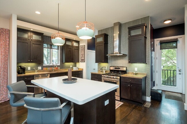 Photo - Luxury 12 South Brownstone with Courtyard | Rooftop Deck with Fireplace & Scenic Views | 2-Car Ga...