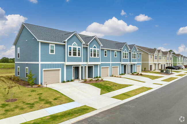 Vista del edificio. - Moorland Reserve Townhomes