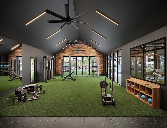 Elevate your workout experience in our contemporary fitness center, designed for ultimate wellness. - Farmhouse at Lantern Commons