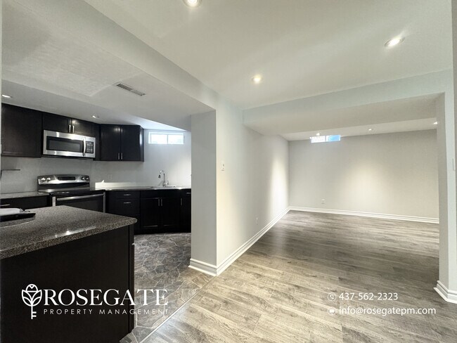 Photo - Bright 2-Bedroom Basement Apartment with P... Unit 2