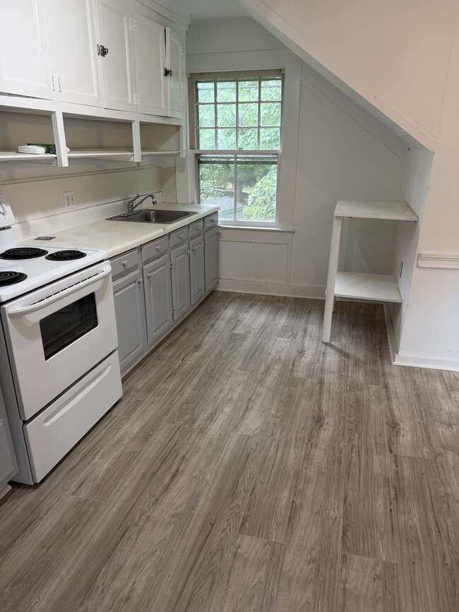Kit with new laminate flooring - 856 Boston Post Rd Unit Garage Apartment