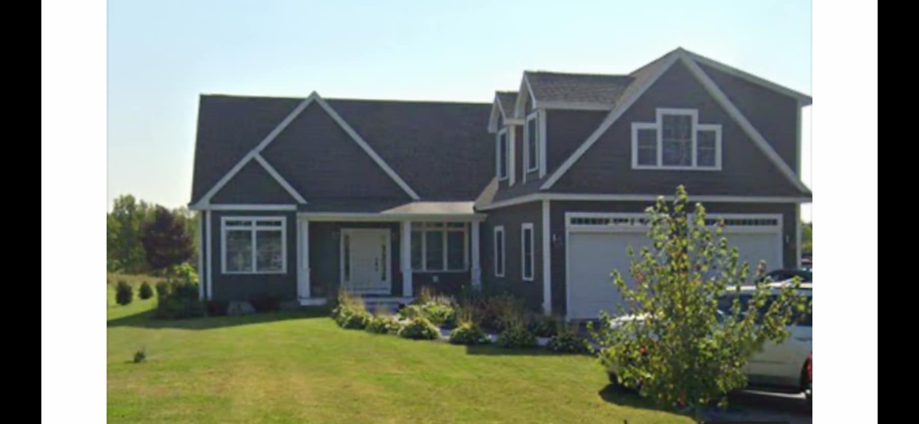 Main home from street-rental unit attached to right side - 17 Winn Rd