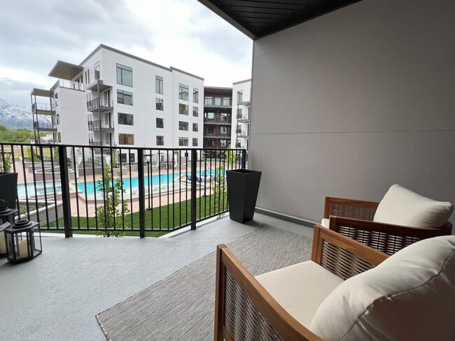 Pool View Balcony - Grandeur Apartments