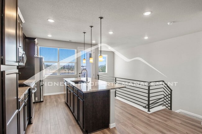 Photo - Contemporary Townhome in the Vibrant Interquest Low Maintenance Community with 2 car garage, Wash...