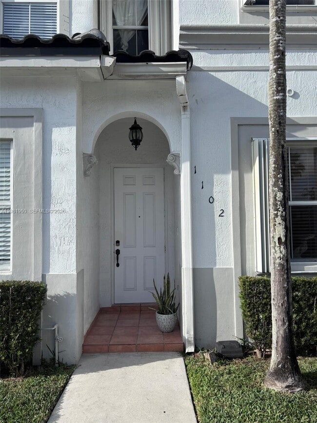 Building Photo - 5590 NW 107th Ave Unit 1102