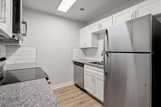 Building Photo - 3500 Peachtree Corners Cir Unit 102E Rental