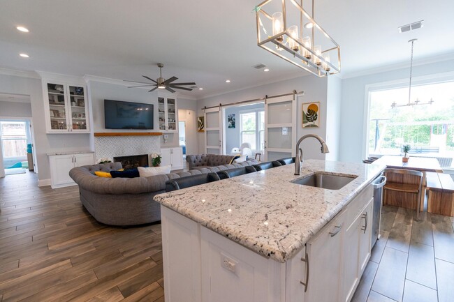 Photo - Waterfront Dream in Island Park | 4BR Retreat with Fire Pit, Flex Space & Backyard Oasis