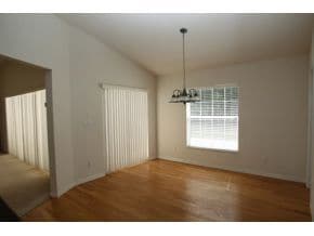 Dining areas with hard wood floors - 3434 SW 10th Terrace
