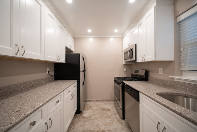 Photo - Leonia Manor: In-Unit Washer & Dryer, Heat, Hot & Cold Water Included, Cat & Dog Friendly, and Wa...