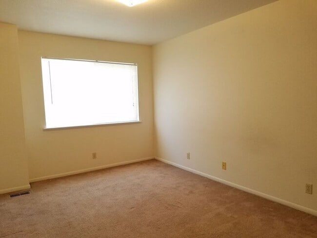 Photo - 2 Bed 1.5 Bath Townhouse End Unit in North Central Loveland - Water/Sewer/Trash Included in Rent!