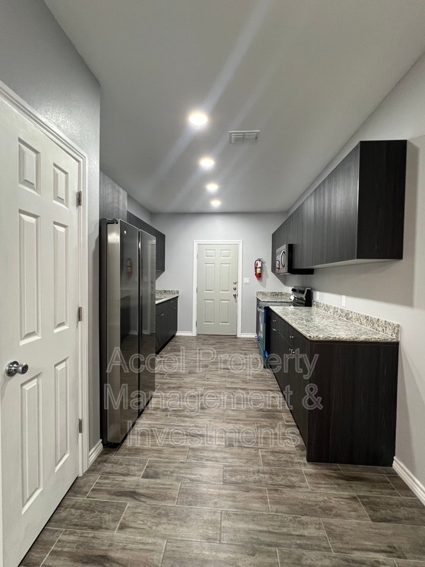 Building Photo - 5909 Puffin Ave Unit #3