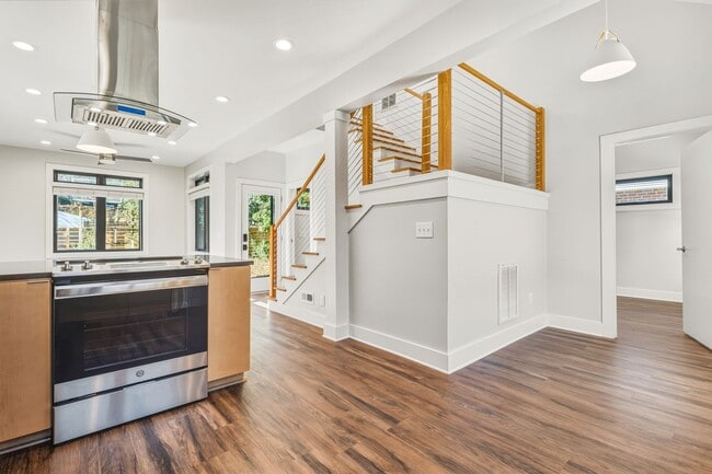 Photo - Modern and welcoming 3 bed 2.5 bath downtown retreat with second story balcony.
