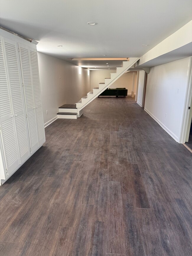 Living/Dining Area w/ Extra Storage - 331 Key West Dr Unit Basement