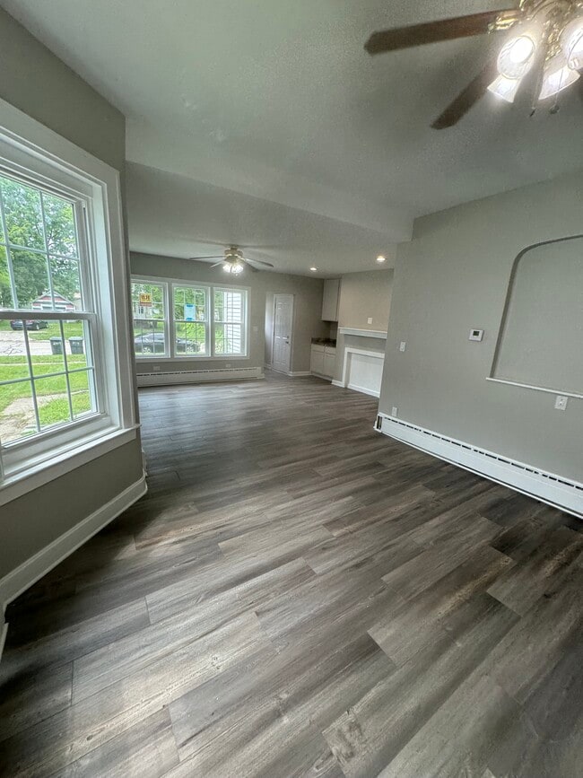 Large renovated living and dining room - 2409 Gilboa Ave Apartments