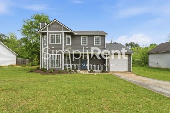 Building Photo - Updated Home with Spacious Layout & Private Backyard