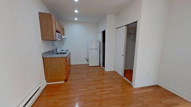 Building Photo - 1234-40 Rising Sun Ave Unit A