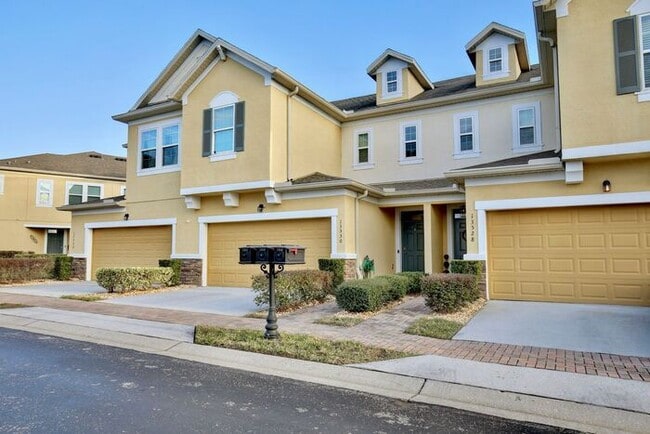 Photo - Gorgeous 4/2.5 Spacious Townhome with a Loft Area and a 2 Car Garage in the Desirable Gated Commu...