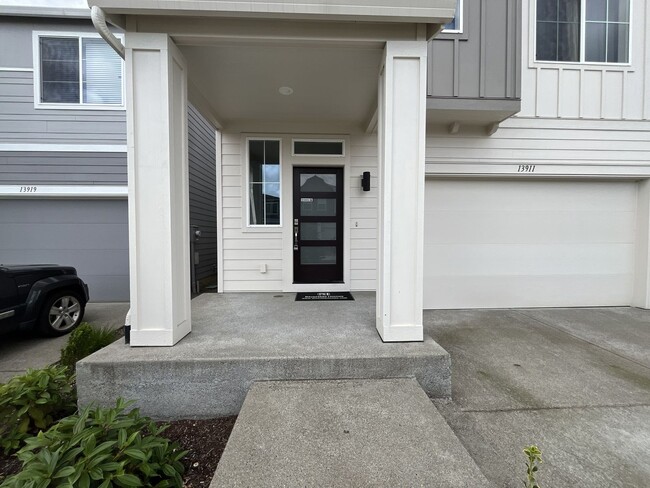 Photo - Stunning 2024 Built 5BR Home with Main-Level Suite, EV Charger & Covered Patio Near River Terrace