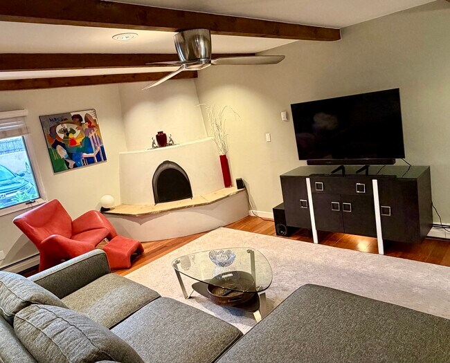 Kiva fireplace - 615 Bishops Lodge Rd